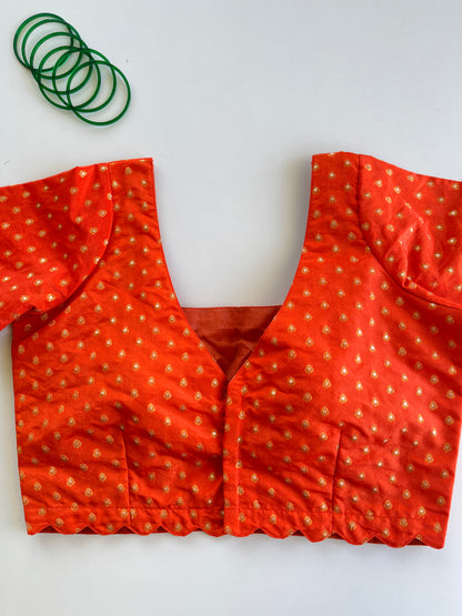 Nithara in Orange